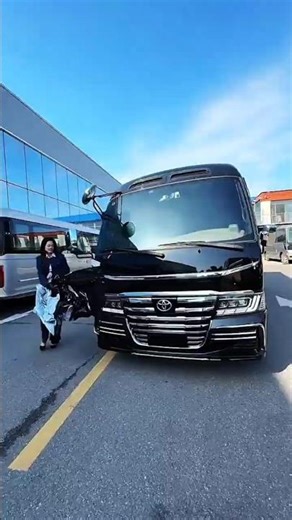 Toyota Coaster 12-seater Business Vehicle.