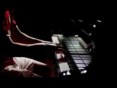 Alexis Sanchez playing piano