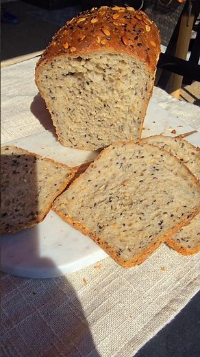 Dave's sourdough seeded killer bread copycat. Soft, fluffy, full of fiber and healthy seeds.