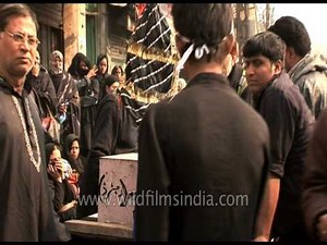 Shia man shows chained knife and blades used for self flagellation | Muharram