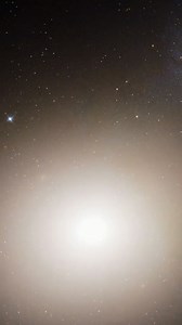 The M60-UCD1 Dwarf Galaxy is considered one of the densest known galaxies, packed with over 150 million stars within a tiny space just 300 light years across, located 50 million light years away in the Virgo cluster; its central black hole is exceptionally large, making up a significant 15% of the galaxy's total mass and capable of flinging nearby stars at tremendous speeds, meaning the night sky from a planet within this galaxy would be spectacularly star-filled due to the close proximity of so