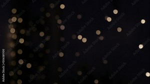 flashing, dimming, and blinking white and yellow blurry lights