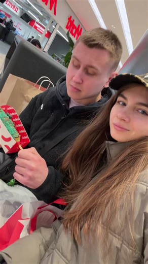 Ukrainian Girl Enjoys Corndog in Netherlands
