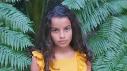 Lifestyle portrait of a mixed race confident, gorgeous preteen tween...