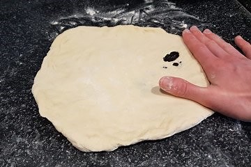 Pizza Dough Tears When Stretching: How To Fix It - Crust Kingdom