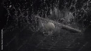 Super Slow Motion Shot of baseball ball and bat at 1000 fps. Waterfall at 1000 frames per second. Sport concept super slow motion shot on high speed camera 1000 fps.