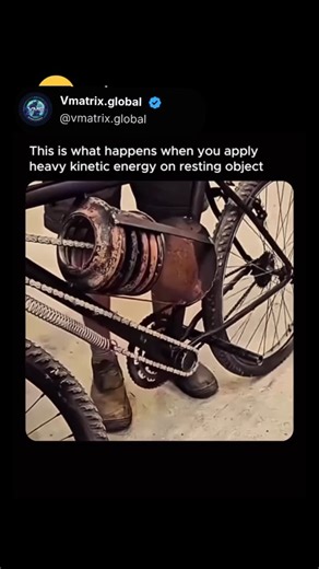 Vmatrix.Global on Instagram: "This video demonstrates a mechanical engineering experiment involving a DIY energy storage system—specifically a heavy flywheel and spring mechanism—mounted to a bicycle frame. The device is designed to illustrate the transformation and storage of kinetic energy: as the rider pedals, the central weighted drum (the flywheel) begins to spin, accumulating rotational momentum. The overlay text, "This is what happens when you apply heavy kinetic energy on a resting objec