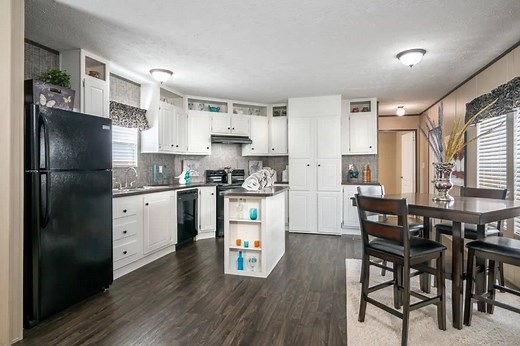 Check out the options in these Display Singlewide Homes available Now at Clayton Homes Elkins. Hidden Utility rooms, Huge Tile Showers, TV ready Living Room and Master Bed room areas, great backsplash and rangehoods in kitchen, accent walls, and various cabinets and woodgrain lino. 888-636-6900 Singlewides start as low as $34,995! | Clayton Homes of Elkins