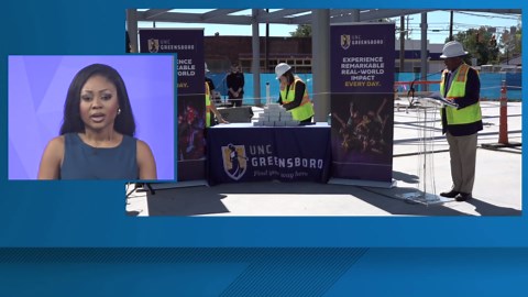 UNC Greensboro holds beam signing for new campus building