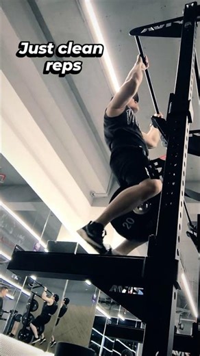 Weighted pull-ups with clean form. Heavy reps, strict control.