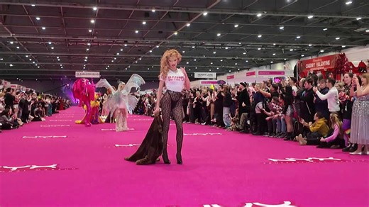 Drag Queens from around the world walk down the Queens Catwalk at Dragcon Uk