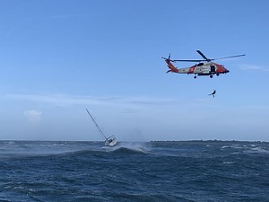 U.S. Coast Guard makes helicopter rescue after boat capsizes near Chincoteague