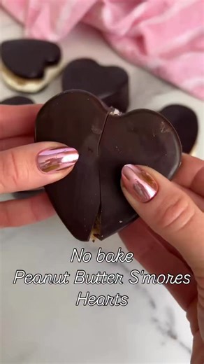 Colleen Forton on Instagram: "Reese's S'mores Hearts! Your favorite Reese's hearts, plus a crunchy graham cracker layer, plus a gooey (homemade) marshmallow filling! There is SO much to love in every bite! Gluten free, dairy free, and refined sugar free if you use my simple & fun homemade marshmallow fluff! Leave a RECIPE to get them sent your way! 🩷 https://colleenshealthylife.com/valentines-reeses-smores-hearts/"