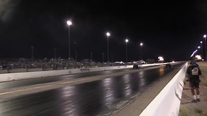 Pat Neal suffered a wheelie bar failure during Friday night qualifying at Tucson Dragway, which sent the car airborne near mid-track! Neal lost all steering control in the Arizona based "Pinball Wizard" and ended up in the wall, thankfully walking away from this wild ride! | Fuel Altered Chaos