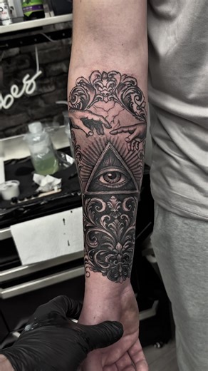 Religious/ornamental half sleeve 🤘🏻 #religioustattoo #angeltattoo #ornamentaltattoos #eyeofprovidence #allseeingeye