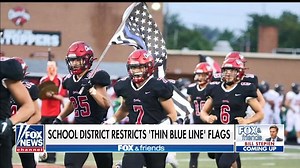 74K views · 3.1K reactions | School district restricts Thin Blue Line flags after football players carried one to honor coach Ohio school district says flag could be seen as 'racially motivated'; Geauga County commissioner Ralph Spidalieri speaks out. | Fox & Friends | Facebook
