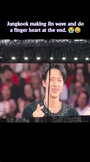 Jungkook making sure Jin ended his speech with a wave and a finger heart. 😂😭| BTS CONCERT AT PARIS