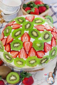 A unique and fun cake to make for any occasion! This strawberry kiwi cake is filled with vanilla custard and whipped cream! Get the recipe: https://tatyanaseverydayfood.com/recipe-items/domed-trifle-cake/ | Tatyana's Everyday Food