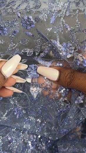 Hand Sewing Chandelier Stones on a Prom Dress