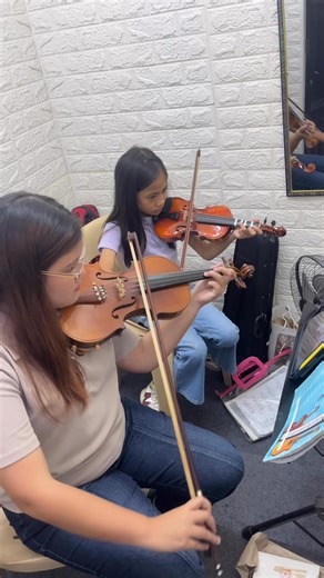 From watching in the crowd to playing side by side! Cassey was inspired by Analou’s violin performances during school events, started learning at 8 just like her, and now these two are practicing for their upcoming gig ✨🎶 | JCS Musical Instruments and Music Studio