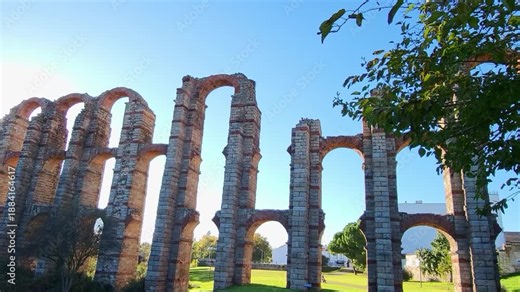 Roman aqueduct of Mérida. Spain. Acueducto de los Milagros. Aqueduct of Miracles. Panoramic view of a Three-tiered aqueduct. Roman aqueduct. Ancient Roman construction.