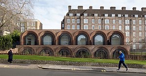 modern arching townhouses recall london's victorian and neo-classical past