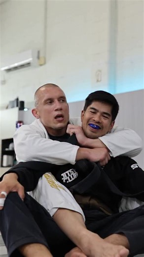 Southside Training Centre on Instagram: "Coach Pasha Stolyar works through a detail for the cross collar choke."
