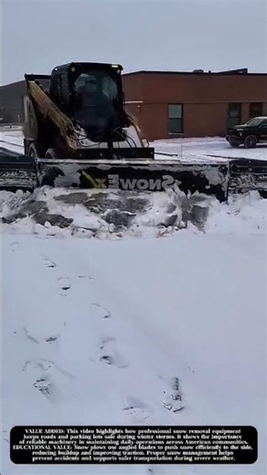 Heavy-Duty Snow Plow in Action Clearing a Winter Parking Lot