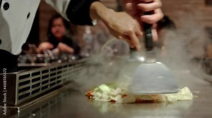 Fresh cooking .Teppanyaki Japanese Food of Japanese chef cooking of meat with vegetable grill, In the traditional Japanese food of Hibachi teppanyaki style. Stock Video