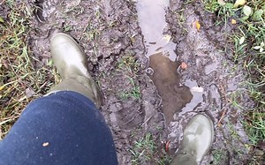 Falling over in the mud after my boots got stuck
