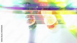 Acid trip effect, detail shot: the colorful lights from a merry-go-round carousel.