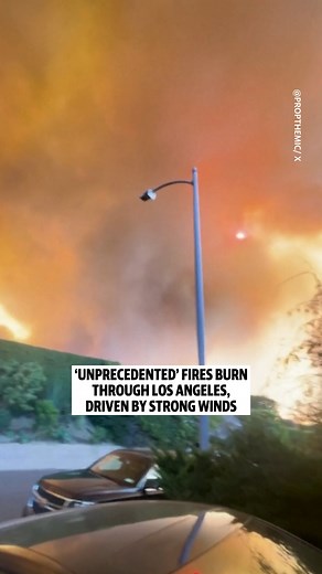 More than 30,000 people in Southern California were under evacuation orders yesterday as “unprecedented” wildfires, driven by powerful winds, began to tear through the Los Angeles area. | Yahoo News