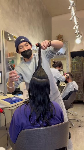 Hair Styling Session in a Chic Salon Environment