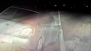 Watch: Suspected drunk driver unwittingly calls cops on himself
