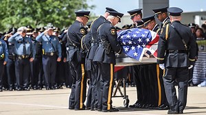 Funerals for two Dallas officers killed in ambush