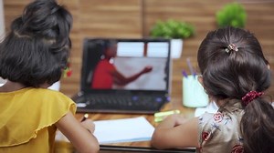 clip-1056829058-back-view-two-little-kid-siblings-sharing