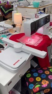 The Bernina B790 Pro with pinpoint placement embroidering on a sweatshirt using the lovely free arm! | Nashua Sew and Vac