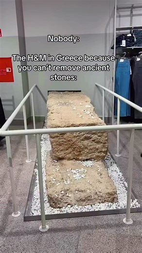 This is Ancient on Instagram: "Inside a modern H&M Rhodes, archaeological remains from ancient Rhodes are preserved and displayed in situ. During renovation and construction works, ancient structural elements were uncovered beneath the shop floor. Rather than being removed, the remains were documented, conserved, and incorporated into the retail space in accordance with Greek archaeological law. The city of Rhodes has been continuously inhabited since at least the Classical period. Its urban fab