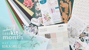 Unbox Koala Smiles, May Card Kit of the month. Let your imagination run wild with lots of die cut shapes, printed paper, embelishments and more to make 10 cards! We hope you adore this cute kit for fun cardmaking, includes a full stamp set and Koala Die Set. #neverstopmaking #spellbinders #cardmakingkit | Spellbinders Paper Arts