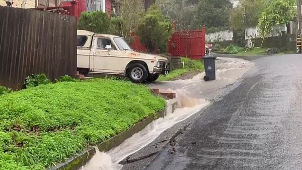 Watch: Rain runoff moves through San Rafael neighborhood