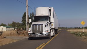 Download Semi truck driving on rural road.  Fully released for commercial use. for free