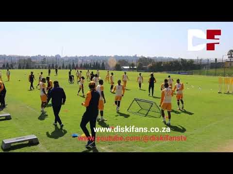Kaizer Chiefs players warming-up and training