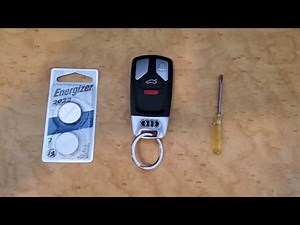 How do i replace the remote control battery of the Audi Q7?