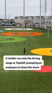 1M views · 7.3K reactions | A rebellious toddler sprinted down the driving range at a Topgolf facility in Wichita, KS, to roars of laughter from other patrons in the hitting bays. A video shared by Adlai Ruffin shows a small child running at top speed down the driving range, zigging and zagging to evade a woman in hot pursuit. The woman eventually caught up to the child and safely removed them from the range. (via TMX) | NowThis | Facebook