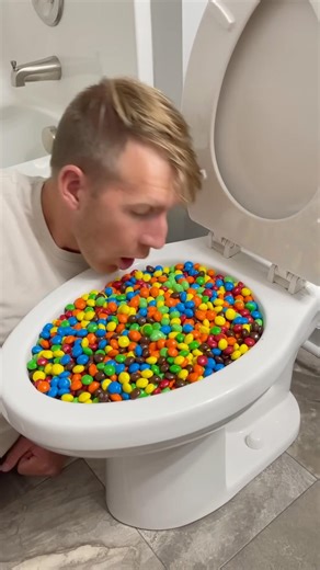 Eating Mini Chocolate M&M in Toilet #shorts
