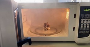 Here's Why Your Paper Towel Caught Fire In The Microwave