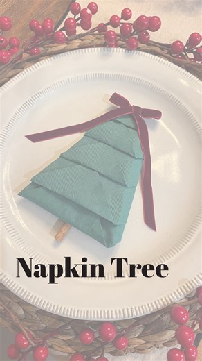 YOU’RE GONNA WANT TO SAVE THIS! A quick & easy trick to elevate your table this season-for the cost of a paper napkin! Follow these simple steps to give your space that cozy, styled look without spending a dime more! 1-follow video for folding instructions (SAVE THIS TO REFERENCE) 2-add a cinnamon stick for the trunk 3-adorn the top of the tree with a simple ribbon tablescape #diydecor #easyhomeideas #christmastablescape #ralphlaurenchristmas #christmasdiy | little_country_mama