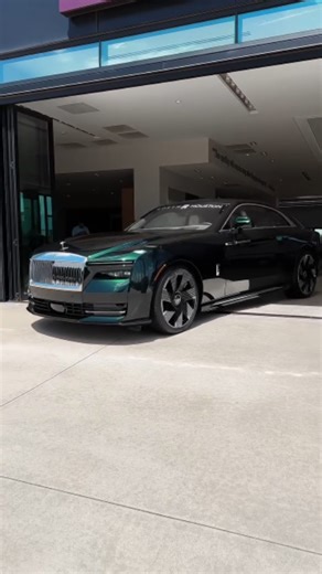 Rolls Royce Fan on Instagram: "Rolls-Royce Spectre  Emerald Green, kissed by sunlight. A graceful exit from our showroom—where elegance meets electric. #RollsRoyce_Fan #RollsRoyceNorthHouston #Spectre #RollsRoyce"