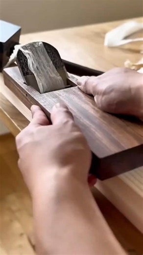 Using A Japanese Hand Plane To Smooth This Wood Block Surface For A Flawless Precision