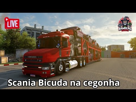 Scania bicuda na cegonha carregada com caminhonetes